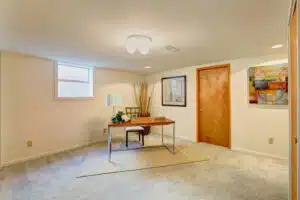 Basement,Light,Tone,Office,Room,With,Desk,And,Chair,In Basement,Light,Tone,Office,Room,With,Desk,And,Chair,In