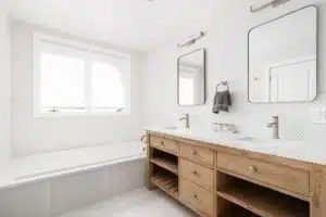 A,Bathroom,With,A,Natural,Wood,Cabinet,With,A,White A,Bathroom,With,A,Natural,Wood,Cabinet,With,A,White